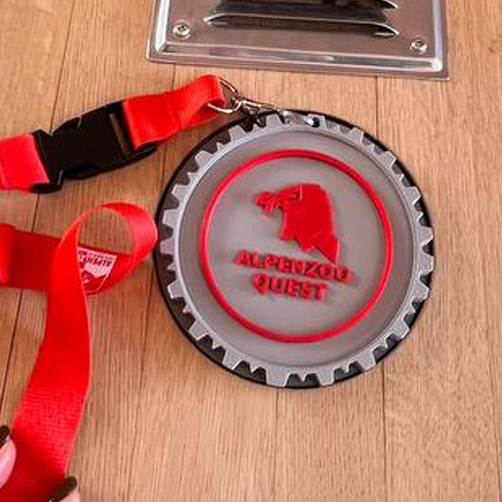 Adventure Quest amulet with branded strap