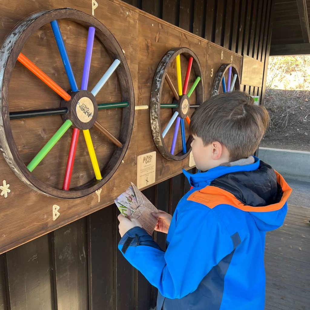 Interactive zoo stations and final reward flow at Alpenzoo